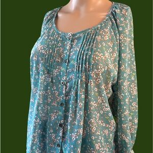 Very cute green flowy cross top